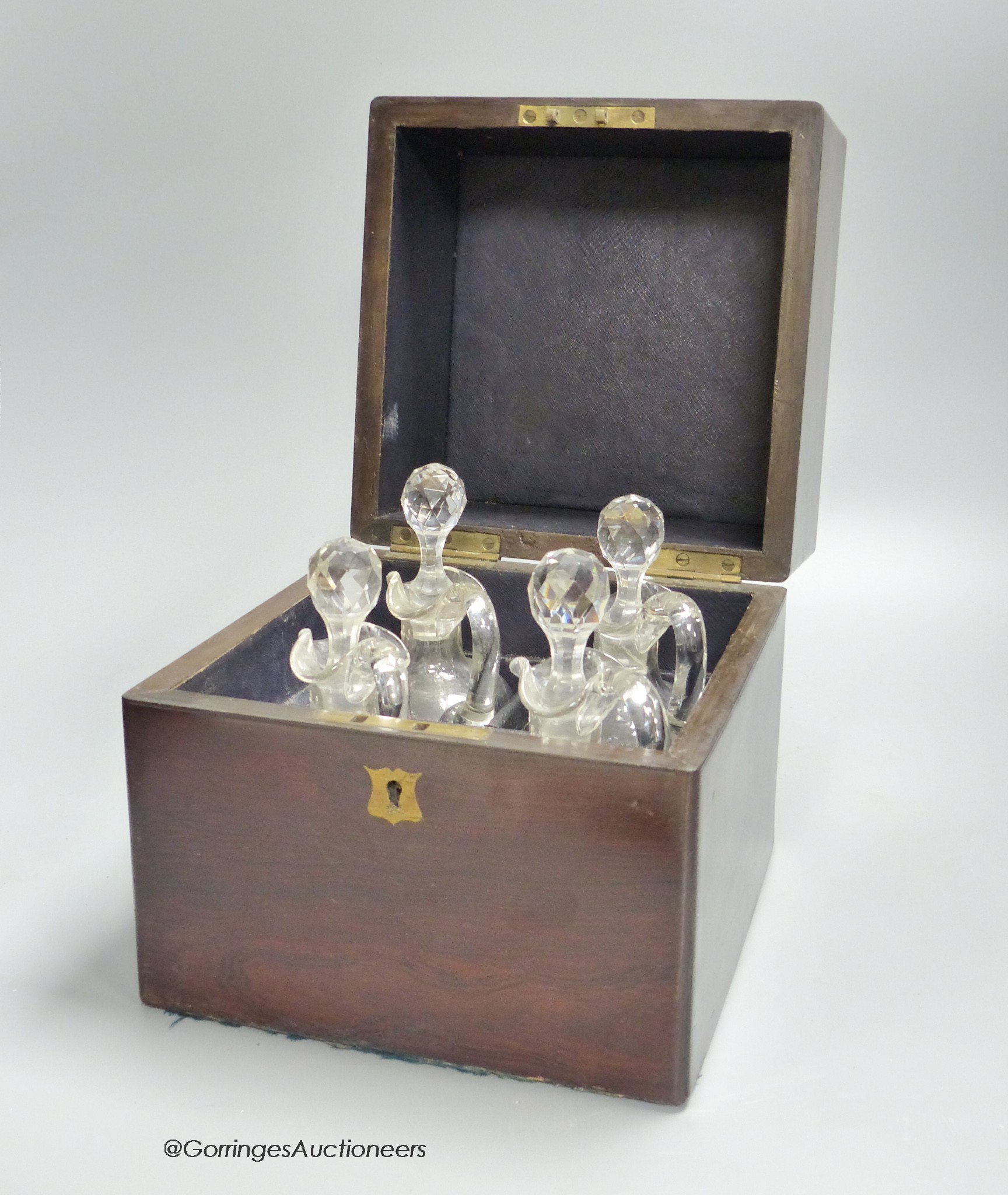 A Victorian rosewood case set of cut glass liqueur decanters, case is 22cm high, width 20cm, depth 20cm